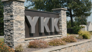 Sign in front of YKK's Macon Plant